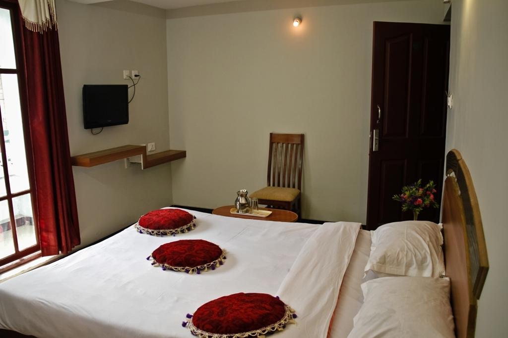 Green Apple Residency Ооти Стая снимка